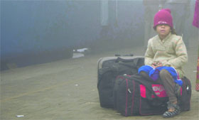 Amritsar railway station witnesses a lone boy on Tuesday as dense fog enveloped the region.