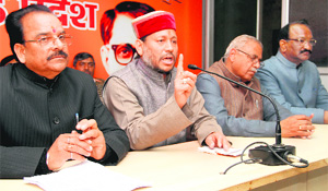 Uttarakhand BJP chief Teerath Singh Rawat along with the Leader of the Opposition in the Assembly, Ajay Bhatt, addresses mediapersons in Dehradun on Tuesday. 