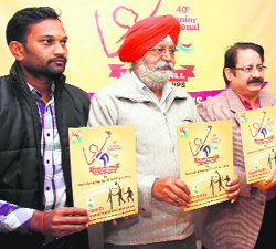 Office-bearers of the Uttarakhand Volleyball Association release the dates of the 40th Junior National Volleyball Championship in Dehradun on Tuesday. 