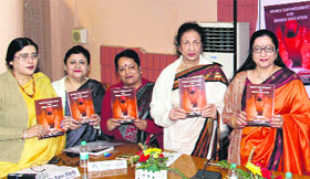 Dignitaries release the book, "Women Empowerment and Higher Education", at Kanya Maha Vidyalaya in Jalandhar on Tuesday.