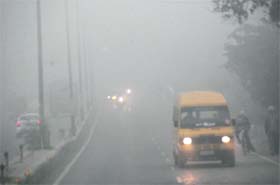 Natures blanket: Commuters brave the fog in Bathinda on Wednesday. The arrival of fog has affected life in the region