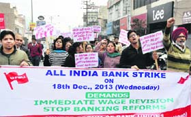 Bank employees hold a protest rally in Bathinda on Wednesday