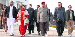 Prof Prem Kumar Dhumal with other BJP MLAs come out of the Vidhan Sabha at Tapovan on Wednesday. Photo : Kamaljeet