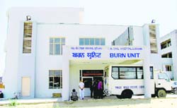 The burn unit at Lord Mahavir Civil Hospital became operational in November; and (below) chemists closed down shops following police raids at Pindi Street. Photos: Inderjeet Verma