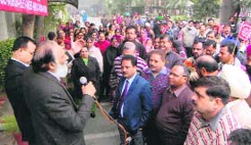 Protesting to get heard: Associate Banks' Officers Association general secretary Pramod Sharma addresses employees of the State Bank of India during a strike in Patiala on Wednesday