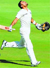 Virat exults after scoring a hundred on the first day of the first Test in Johannesburg on Wednesday.  AFP