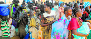 People seek refuge  at a UN base camp after fierce clashes broke out in Juba on Wednesday. 