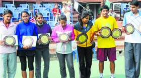 Winners of the CLTA-AITA Tennis Tournament with their trophies at the CLTA courts in Chandigarh on Thursday