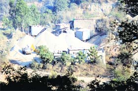 Crushers installed in a forest area along the Jammu-Srinagar national highway