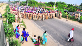 A blockade puts commuters to inconvenience in Ludhiana.
