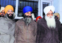 French national Pal Singh (in white turban) with the other two convicts in Amritsar on Thursday.