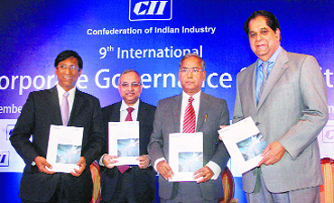 PR Ramesh, chairman of Delloite, Chandrajit Banerjee, Director-General, CII, UK Sinha, chairman of SEBI and KV Kamath, non-executive chairman, ICICI Bank, release a report during the CII's 9th International Corporate Governance Summit in Mumbai on Friday.