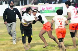 A Pakistan kabaddi team player being stopped by an Indian player during the semi-final match in Bathinda. A Tribune file photo