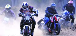 Bikers ride through a rough patch during the trials for the 5th OYA Autocross and Motocross-cum-Offroad Challenge in Phase VIII, Mohali, on Friday. Tribune photo: Vicky Gharu