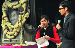Artistes sing a song during the birth anniversary of Mohammed Rafi at the Tagore Theatre in Chandigarh on Friday. Tribune Photo: S Chandan