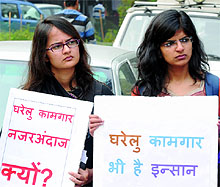 Activists under the banner of Gharelu Kamgar Sanghatan (Haryana) during a protest against the apathy of the government towards the Indian workers abroad, at Jantar Mantar in New Delhi on Friday