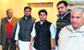 Union Minister Jyotiraditya Scindia (centre) with Sirsa MP Ashok Tanwar (2nd from left) at his office in Delhi.