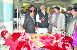 Health and Family Welfare Minister Sunil Kumar Jiyani reviews arrangements during a surprise visit to the local Civil Hospital in Jalandhar on Friday.