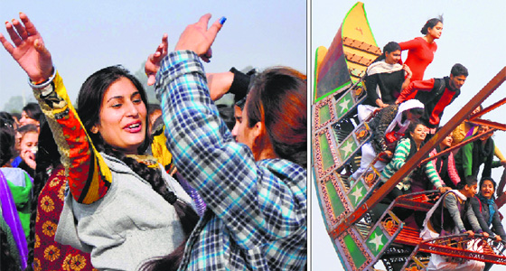 Students enjoy themselves during the Red Cross Mela at Government College for Women in Jammus Gandhi Nagar on Friday.