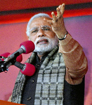 BJP PM candidate Narendra Modi addresses an election campaign rally in Varanasi on Friday. 