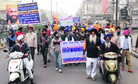Members of the Sardariyan Youth Charitable Trust hold a march in Bathinda on Saturday