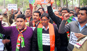 BJP supporters protest outside the Sector 26 police station in Chandigarh on Saturday.