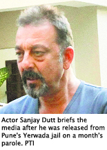 Actor Sanjay Dutt briefs the media after he was released from Pune's Yerwada jail on a month's parole. PTI