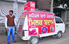 Sukhmandar Singh with his van which he uses as a shop on wheels in Bathinda