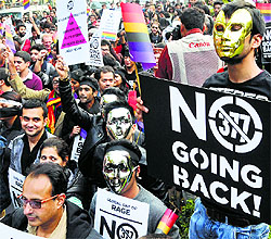 No Going Back: A group of Indian activists hold a banner against section 377 of the Indian Penal Code that criminalises homosexuality during a protest on December 11, 2013