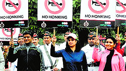 Police Commissioner Alok Mittal and Joint Commissioner of Police Bharti Arora take part in an anti-honking drive in Gurgaon on Sunday