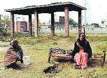 Kasturi Devi and Balak Ram at the cremation ground in Kansapur village in Yamunanagar