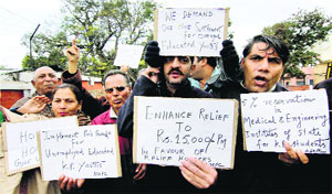 Kashmiri Pandits raise slogans during a protest in Jammu on Sunday. 