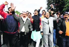 BJP activists protest against the clean chit given to National Conference MLA Sajjad Ahmad Kichloo in Jammu on Sunday