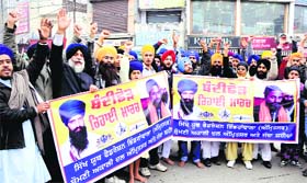 Activists of Sikh organisations hold a protest in support of Gurbaksh singh in Amritsar on Sunday