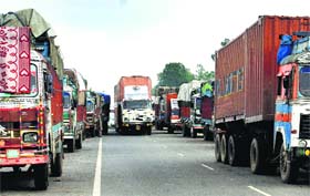 Trucks loaded with goods queue up at Shambhu barrier near Rajpura on Sunday