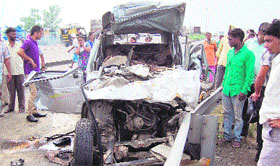 The mangled remains of the Bolero which rammed into a tourist bus, killing three persons including a child in Amritsar.