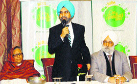 Rajwant Singh (centre) addresses the stakeholders meet in Amritsar on Monday.
