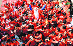 Students of Tribune Model School celebrate Christmas on the school campus on Monday. Tribune photo: Manoj Mahajan