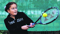 Sugandha in action during a tennis match held at Shemrock Ace Tennis Academy in Mohali on Monday. 
