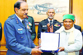 Defence Minister AK Antony presents a memento to Chief of Air Staff Air Chief Marshal NAK Browne at a farewell function in New Delhi on Monday.
