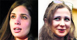 Nadezhda Tolokonnikova (left) and Maria Alyokhina speak to the media after being released from jails in Russia on Monday.