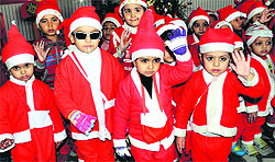 Students of Blooming Buds Playway School celebrate Christmas in Bathinda on Tuesday
