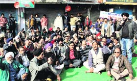 Traders hold protest over property tax in Jalandhar on Tuesday