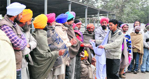 Drug addicts give away their contraband outside the Ultra Tech Cement plant in Bathinda