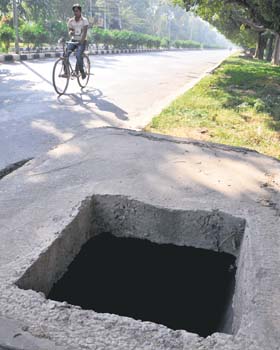 Open manholes pose a threat to pedestrians at Sectors 5 in Panchkula