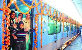 A family in a jubilant mood during its first ride on the Chandigarh-Amritsar Superfast Intercity on its inaugural run from the Chandigarh railway station