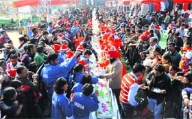 Too sweet to resist: Chandigarh breaks into celebrations as residents cut a 201-foot Christmas cake at Sector 34 on Wednesday