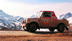 A vehicle takes part in the Uttarakhand Adventure Car Rally