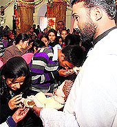 Devotees during a ritual at the church