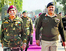 The DGMOs of Pakistan and India, Maj Gen Aamer Riaz (right) and Lt Gen Vinod Bhatia, before a meeting at the Wagah-Attari border on Tuesday